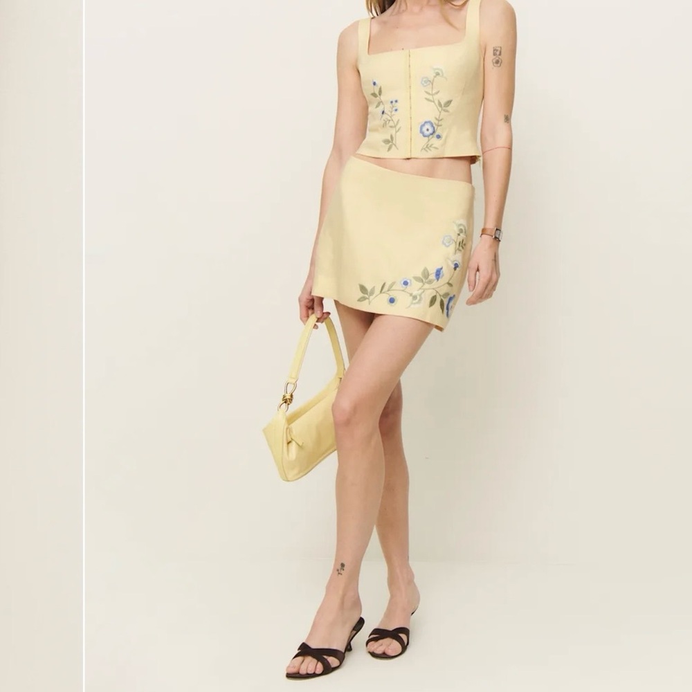 Reformation butter yellow linen Mini Skirt with Blue Floral Design